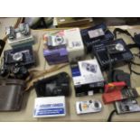 Quantity of various cameras, pair of binoculars and cine equipment etc.