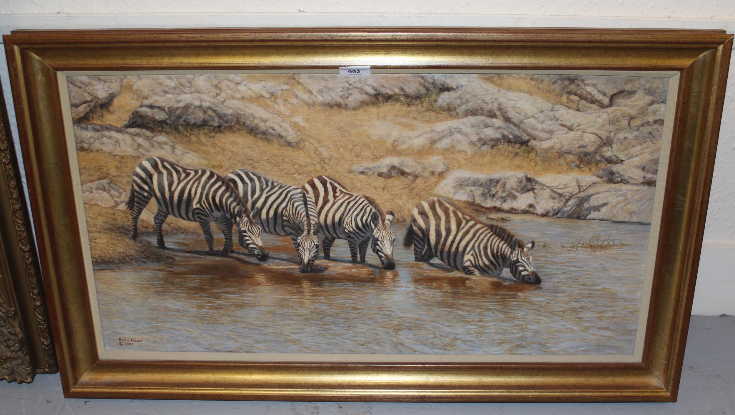 Brian Foster, oil on canvas, group of four zebra at a waterhole, signed and dated 1987, 16ins x - Image 2 of 3