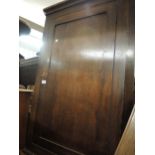 George III oak hanging corner cabinet with a single panel door, 29ins wide together with a