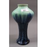 Boch Freres baluster vase decorated with a blue green slip glaze, printed and incised marks to base,