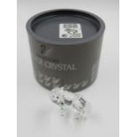 Swarovski figure of a wolf, Serial No. 207549, in original grey cylindrical box