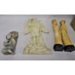 Pair of 20th Century resin tusk shaped figures, another resin figure of an angel, carved soapstone