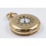 Waltham gold plated half hunter pocket watch, the enamel dial with Roman numerals and subsidiary