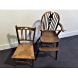 19th Century child's Windsor high chair with a pierced vase and stickback above a carved panel seat,