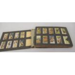 Album containing a collection of miscellaneous early 20th Century cigarette cards All look to be