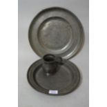 Antique pewter plate, 12.75ins diameter together with a similar, smaller plate and a baluster form