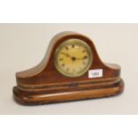 Mahogany and inlaid mantel clock with Roman numerals, together with two black slate clocks