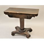 William IV rosewood rectangular fold-over card table with a carved frieze above a hexagonal