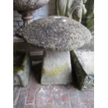 20th Century reconstituted cast staddle stone on square tapering base, 21ins high