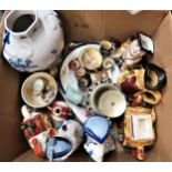 Blue and white Delftware baluster form vase decorated with figures, small cup and saucer decorated