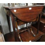 19th Century mahogany oval drop-leaf Pembroke table with single end draw, having brass ring