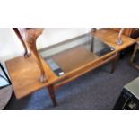 Mid 20th Century G Plan teak rectangular two tier coffee table with a glass inset top, 54ins x 20ins