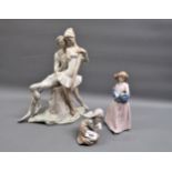 Small Lladro figure of a girl holding a lamb, large matt glazed Lladro group of a ballet dancer (