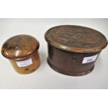 Small oak oval treenware box, the cover carved with thistles, and another circular treenware box