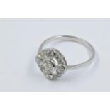 Platinum ring of circular pierced design set brilliant cut diamonds This is a modern ring in 'as new