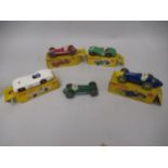 Four boxed Dinky Toys racing cars, No. 110, 231, 234 and 237, together with an unboxed Dinky Toys