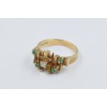 Modern 9ct gold emerald and diamond ring of stylised design, 5g