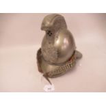 Late 19th / early 20th Century Merryweather fireman's helmet with embossed silvered decoration and