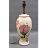 Modern Moorcroft table lamp decorated with the Hibiscus design on a cream ground, 12.5ins high