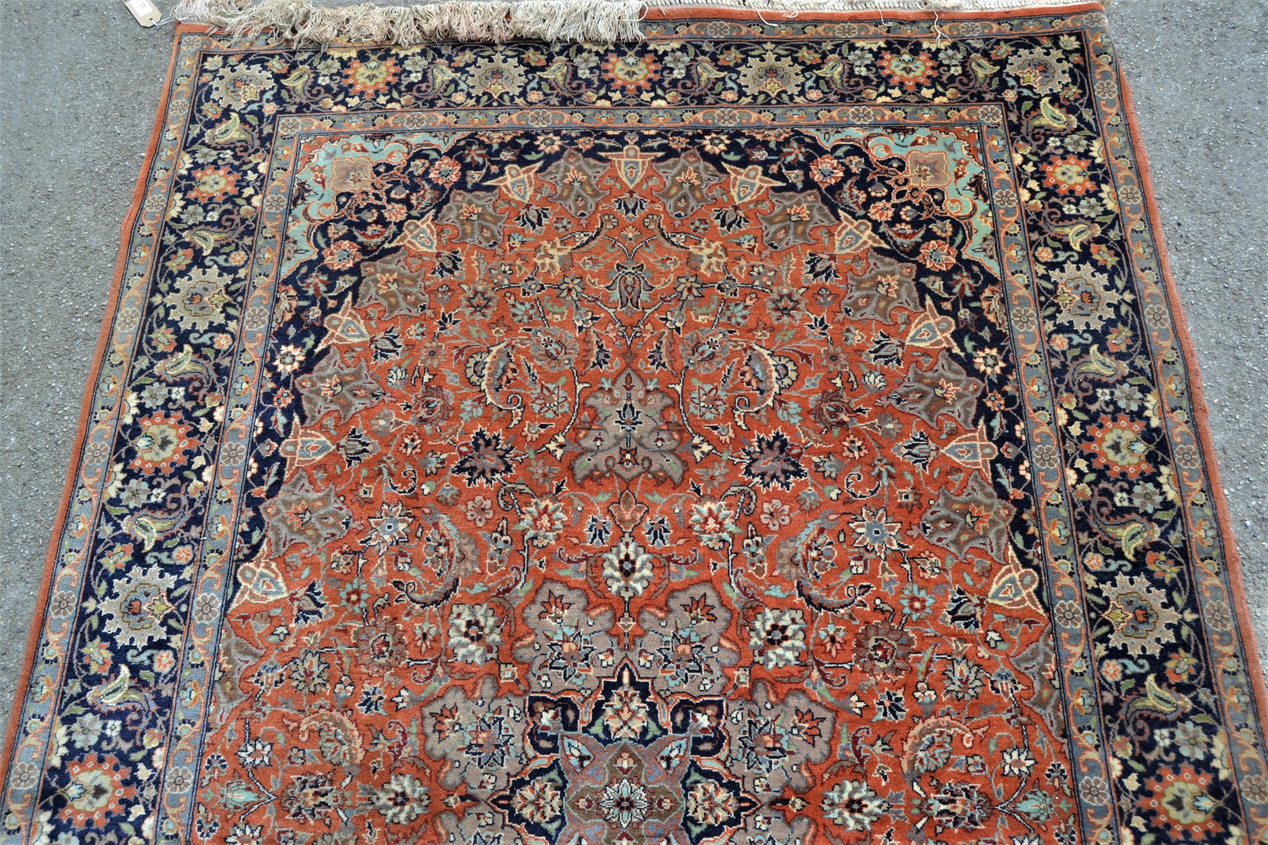 Indo Persian rug with a lobed medallion and all-over palmette design on a mid tan ground with - Image 2 of 4