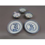 Three Chinese Nanking Cargo blue and white tea bowls and two saucers Various chips as shown in