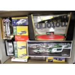 Box containing a quantity of miscellaneous diecast models including three Atlas edition Aston Martin