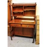 Small late 19th Century walnut Aesthetic side cabinet, the galleried top with open adjustable