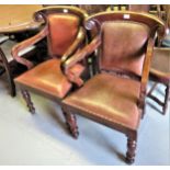 Pair of Anglo Indian style open armchairs with shaped carved cresting rails above leather