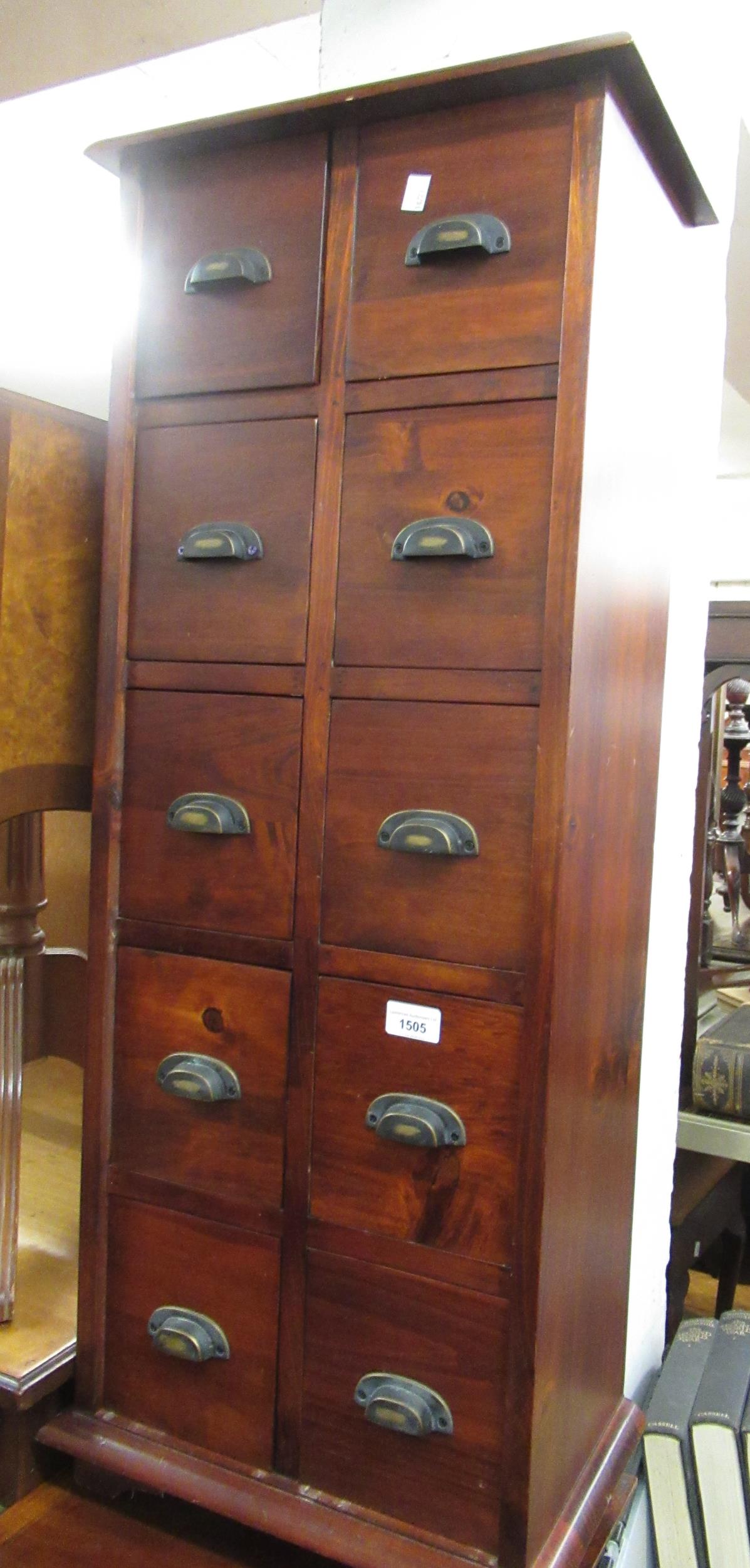 Small reproduction mahogany narrow chest of ten drawers, with brass cup handles. 16ins wide x