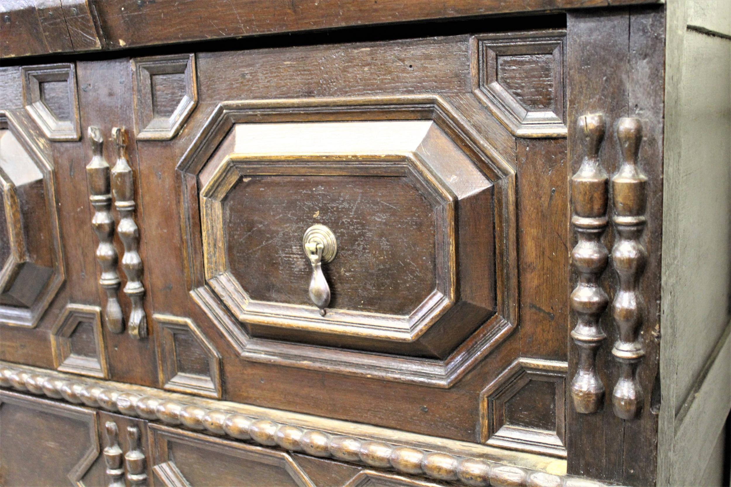 Early 18th Century style oak chest, the plank top above three moulded drawers, raised on low bun - Image 2 of 2