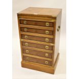 Reproduction yew wood military style narrow chest with fold-over swivel top above six drawers, 18ins