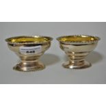 George III silver oval pedestal salt, together with a near matching Edwardian salt, 5.5oz