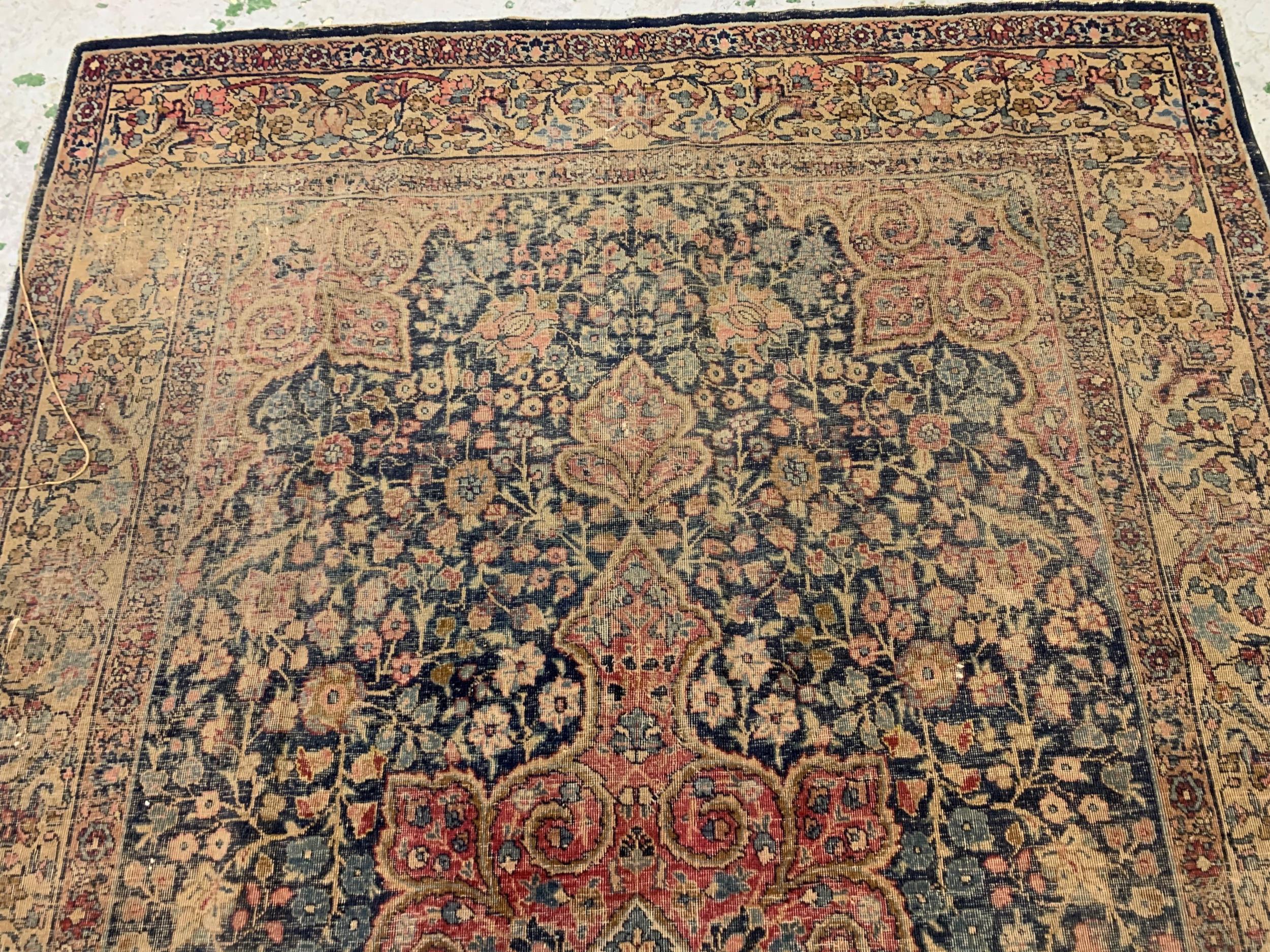 Tabriz carpet with a lobed medallion and all-over floral design on a midnight blue ground with - Image 2 of 5