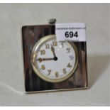 Birmingham silver mounted square travel clock with engine turned decoration, the enamel dial with