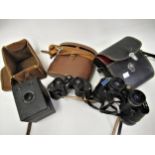 Two cased pairs of binoculars and a box camera