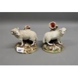 Pair of 19th Century Staffordshire pottery ram and ewe spill vases (at fault)