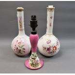 Two Continental porcelain floral decorated bottle vases converted to table lamps, together with
