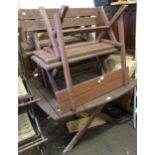 20th Century teak square form garden table with four small benches on crossover supports