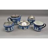 Wedgwood blue Jasperware three piece tea service together with two other jars with plated covers