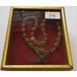 Victorian hair work and yellow metal necklace with pendant cross