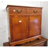 Reproduction yew wood line inlaid side cabinet, having two drawers over two flush panelled drawers