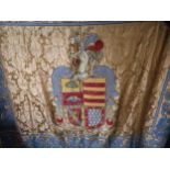 Spanish applique wall hanging decorated with a coat of arms on a beige ground with borders, 5ft x