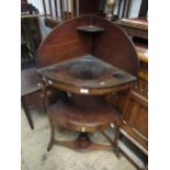 Late George III mahogany and black line inlaid corner washstand with a galleried and recessed top,