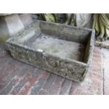 Large weathered reconstituted stone rectangular garden planter with all round moulded decoration