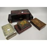 Two small boxes in the form of books, a Japanese musical jewellery box and two other trinket boxes