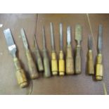 Quantity of various woodworking chisels by Isaac Greaves