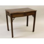 George III mahogany serpentine shaped side table, the moulded top above a single frieze drawer