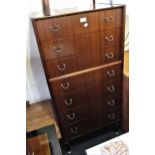 E. Gomme for G Plan, mid 20th Century teak narrow chest of seven drawers with brass handles,