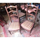 Pair of early 20th Century mahogany ladderback low seat chairs