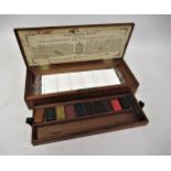 Small 19th Century mahogany artist colour box by Charles Roberson containing some original paint